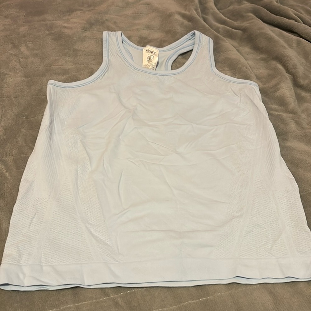I am selling a Medium, Athleta Girl, Light Blue, Razorback Tank Top
